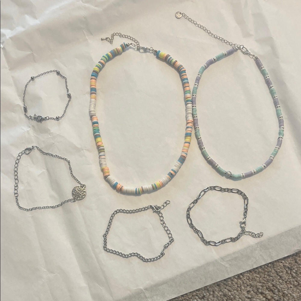 Women’s - 2 Colorful Beaded Necklaces with 4 bracelets.